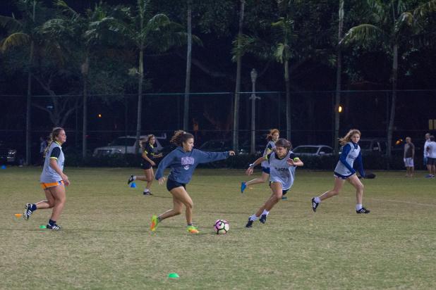 Girls playing soccer 