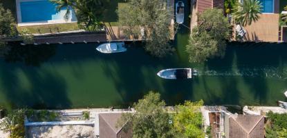 Waterways Boats Passing Through Drone Shot