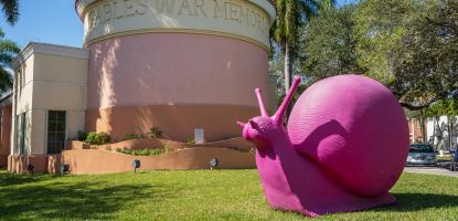 Outside Coral Gables War Memorial Youth Center with giant pink snail