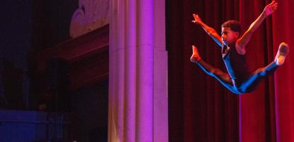 Zachary Roy jumps performs an acrobatic jump