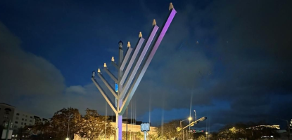 A menorah is lit in front of City Hall