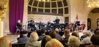 Audience watching orchestra 