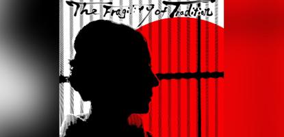 Silhouette of woman in front of a Japanese flag covered window