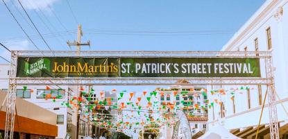 Street parade blue sky with buildings on the side