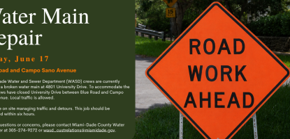Traffic advisory for Water Main Repair and showing a "Road Work Ahead" sign