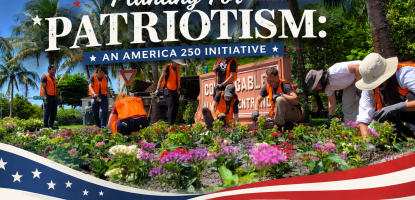 people in orange vests planting on sunny day with American flag graphic at bottom