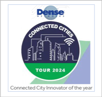 Blue Emblem with green at the bottom and outline of buildings logo 