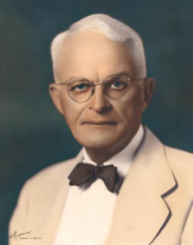 Realistic Painted Portrait of Mayor D Wyman in a cream suit and bow tie