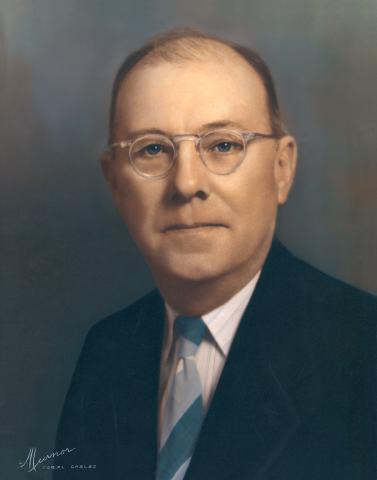 Painted portrait of Mayor Joe Whitley in dark suit and glasses