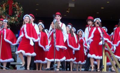 High school students on stage performing Christmas carols