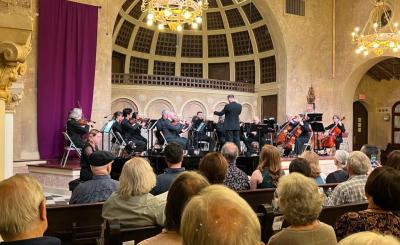 Audience watching orchestra 