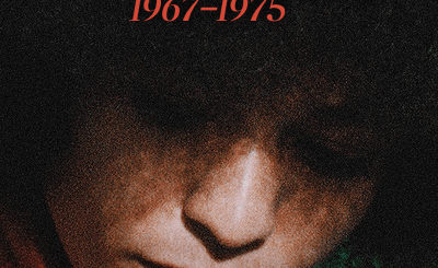 Movie poster of Black woman looking down, half her face in the shade, with title of film