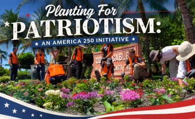 people in orange vests planting on sunny day with American flag graphic at bottom