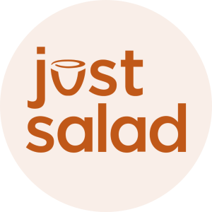 In orange, the words just salad with the u in just as a bowl. 