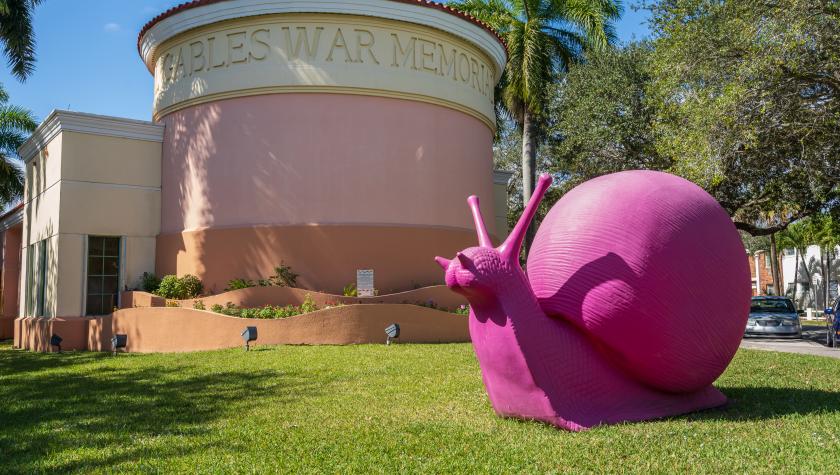 Outside Coral Gables War Memorial Youth Center with giant pink snail