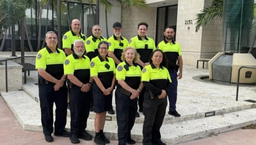 NSA team in yellow green uniform in front of Public Safety Building 